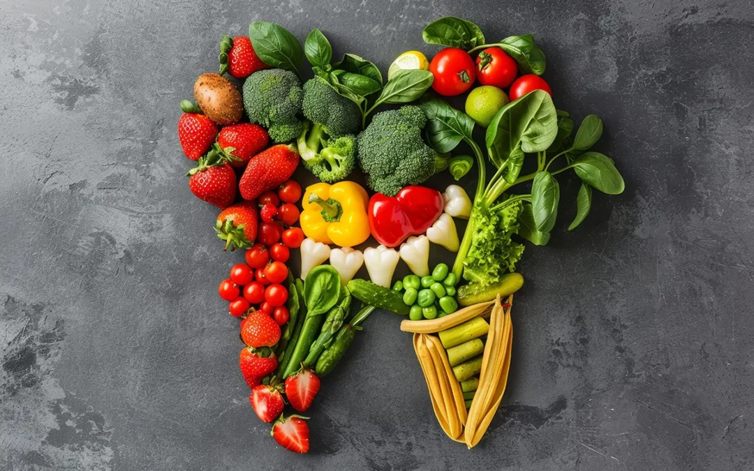 Colorful vegetables and fruits arranged in shape of tooth on gray background. Includes strawberries, broccoli, peppers, tomatoes, spinach, and corn. Represents healthy diet for dental health.